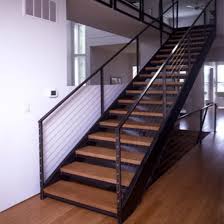 Modern Floating Wood &amp; Metal Staircase with Glass Railing – Indoor Design